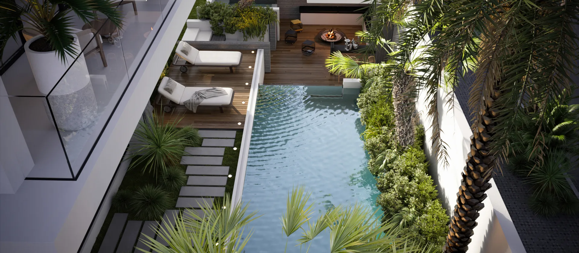 Modern swimming pool design for a private villa with terrace Modern private villa swimming pool design with terrace loungers, timber deck, garden planting, palm trees, and outdoor fire seating.