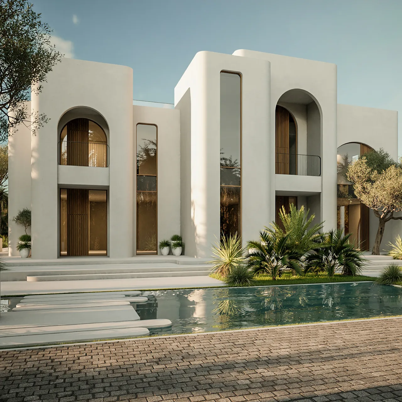 A modern villa with curved white walls, arched upper windows, black metal railings, vertical wood details, lush greenery, stepping stones, and a shallow pool reflecting the facade.