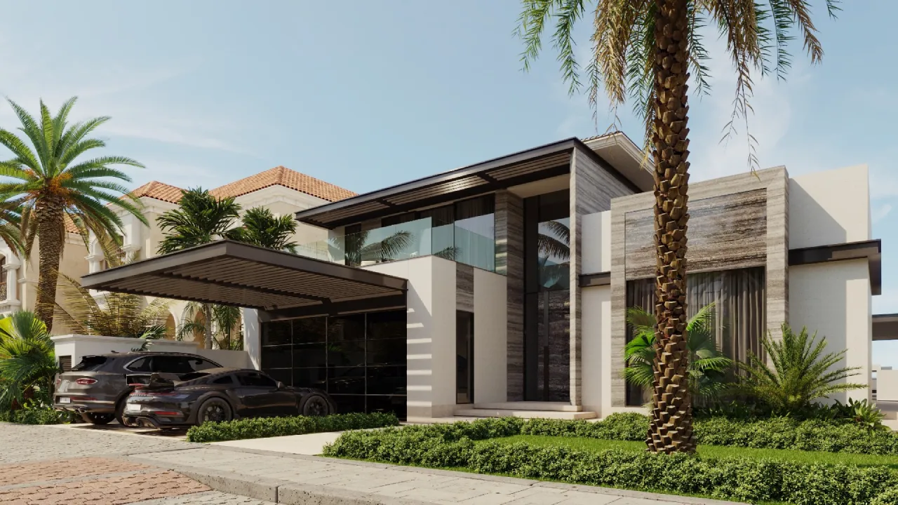 Contemporary bespoke house design with white facade, gray stone cladding, glass balcony, covered carport, parked cars, palm trees, hedges, and tropical landscaping.
