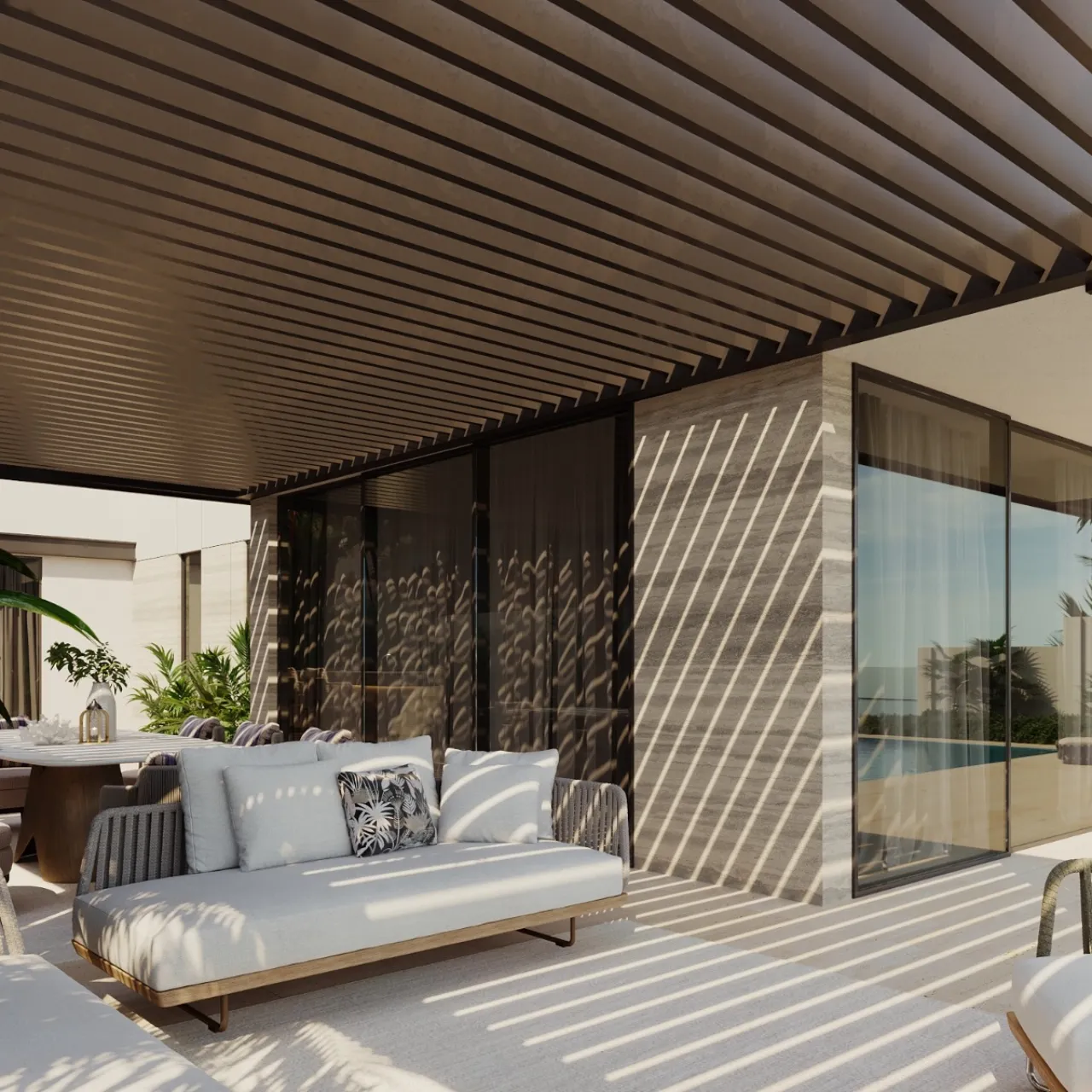 Modern outdoor seating area beneath a slatted pergola, featuring a cushioned sofa, dining table, glass doors, stone wall cladding, and striped sunlight on the terrace.