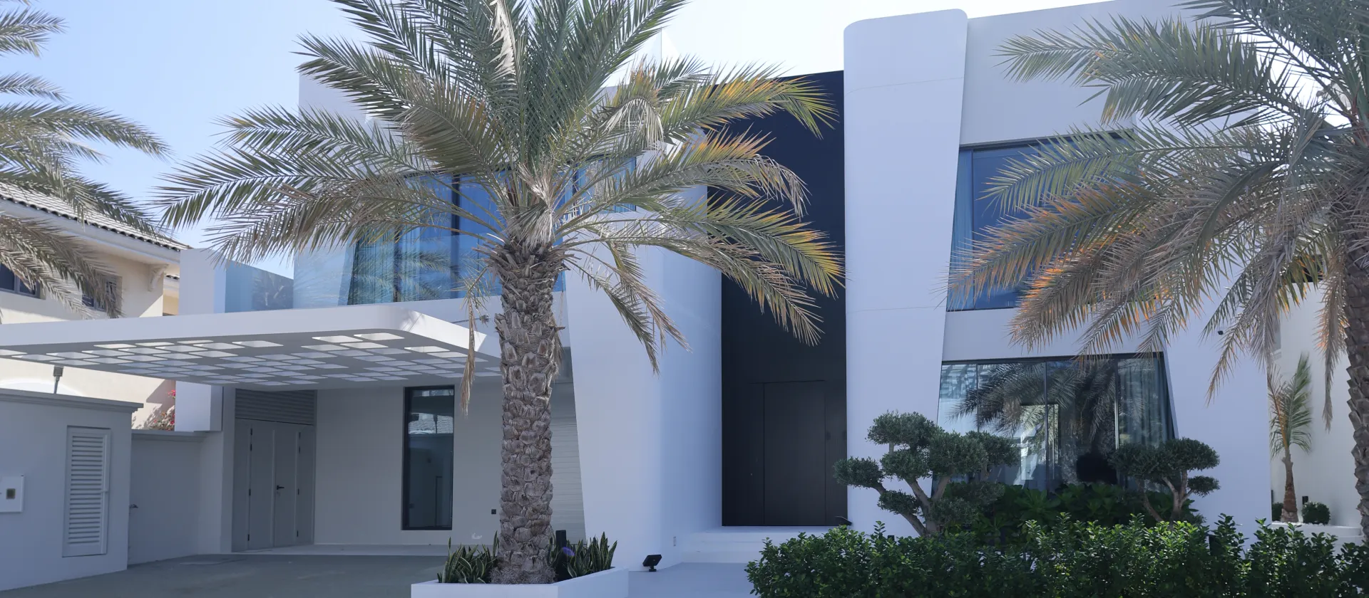 Completed contemporary exterior remodel of a Palm Jumeirah Garden Home villa