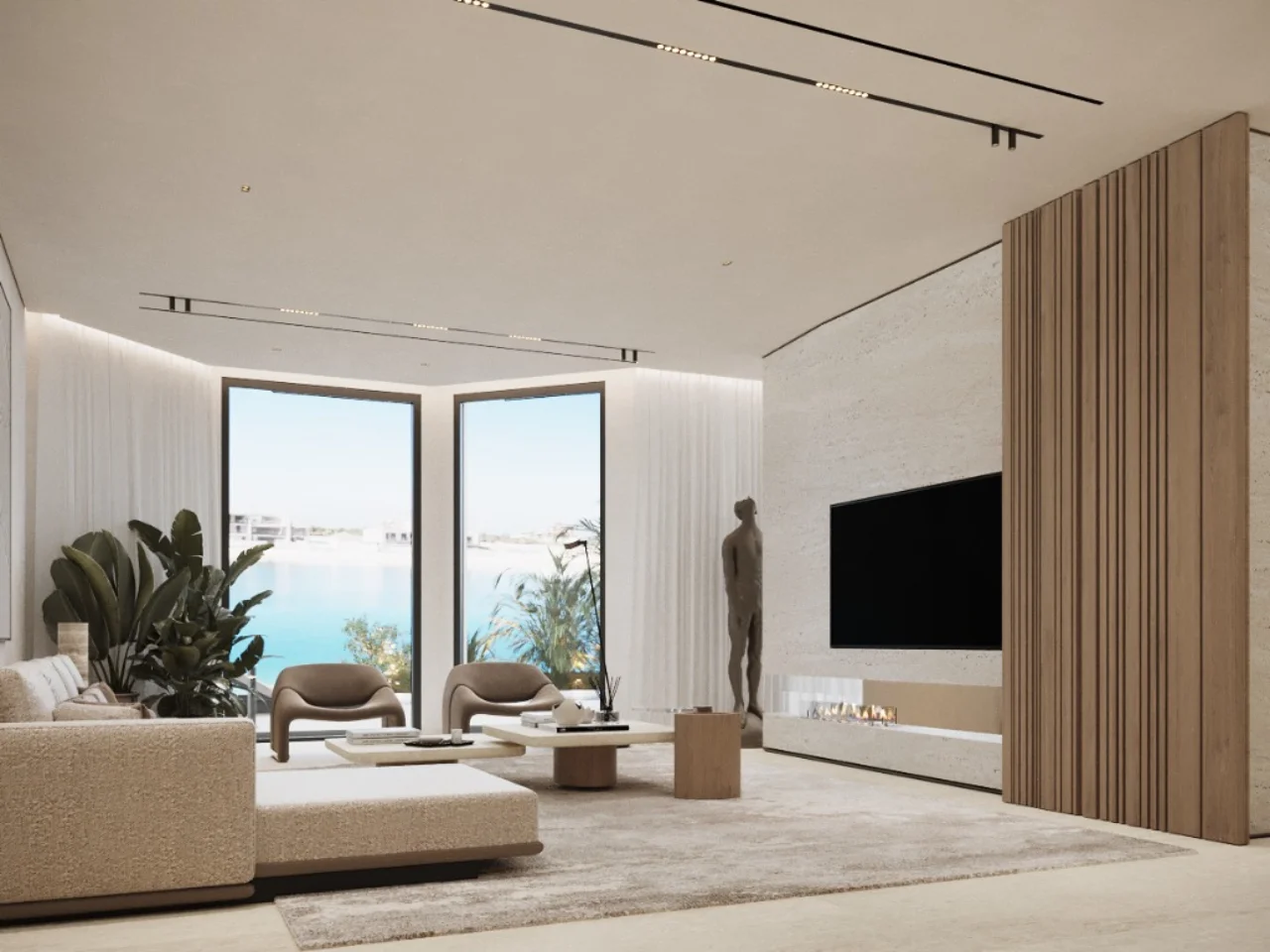 Minimal beachfront villa TV lounge design with linear fireplace, pale stone media wall, wood slat paneling, cream sofa, taupe lounge chairs, plants, and water view