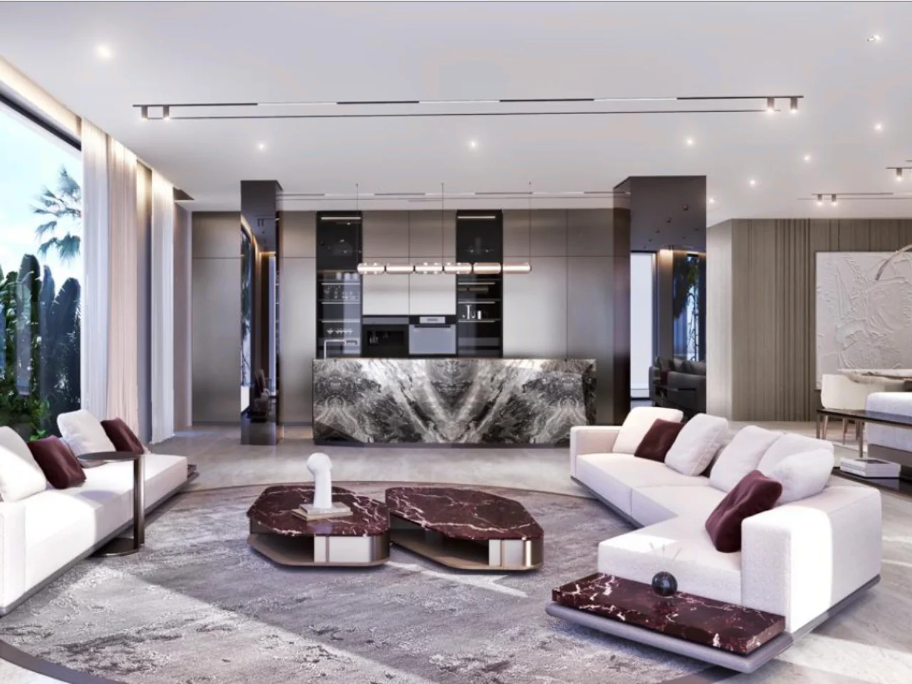 Modern open-plan living room design with white sofas, burgundy stone coffee tables, bookmatched marble kitchen island, dark cabinetry, grey rug, and slim pendant lighting