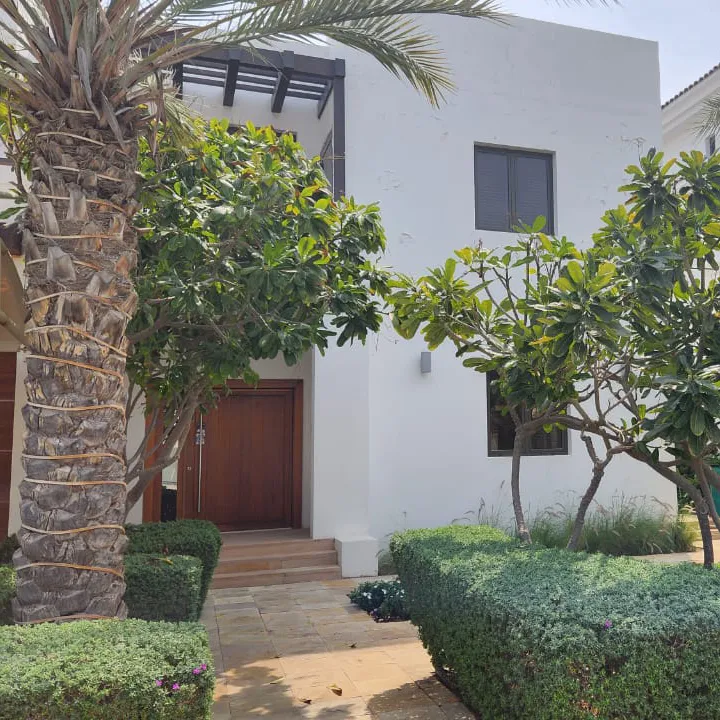 Original planted entrance path of a Palm Jumeirah Garden Home before renovation