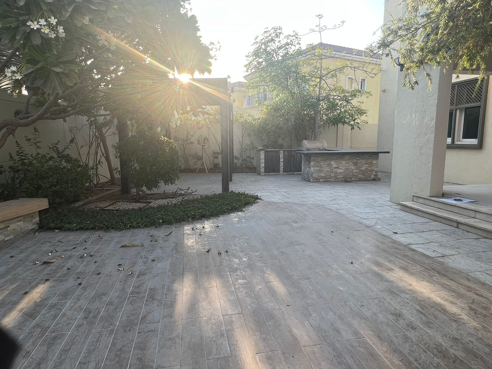 Paved backyard of a four-bedroom Regional Villa in Jumeirah Park before the pool was built