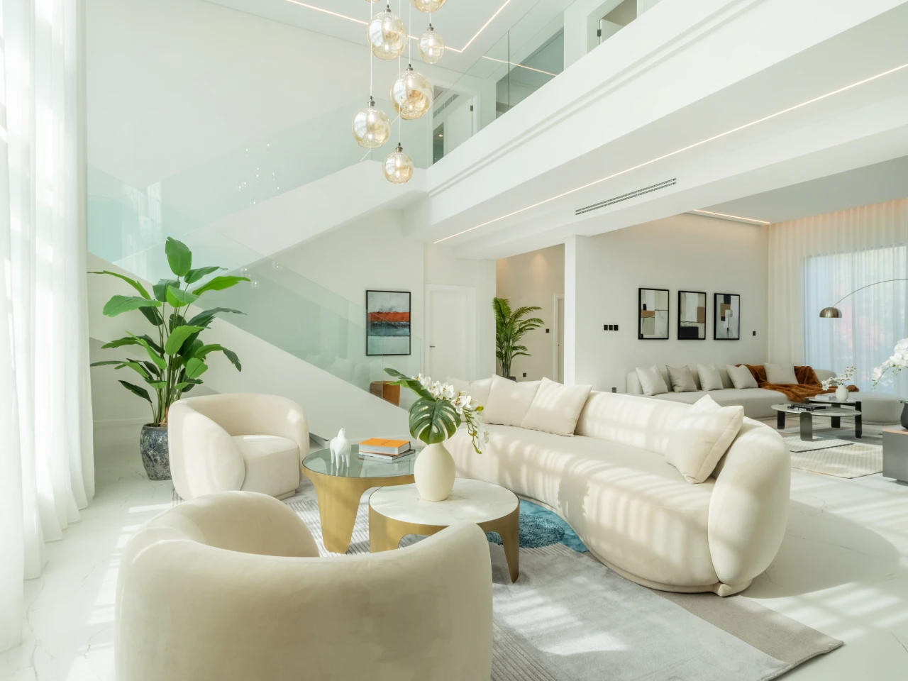 Jumeirah Islands double-height villa living room after renovation by Arta